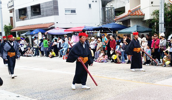 Red-lacquered cudgels during recent Bunka-no-Hi (Culture Day) on Okinawa. Photo courtesy of Ulf Karlsson.